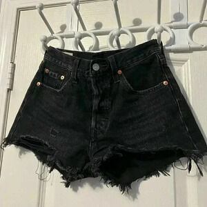 501 DISTRESSED  BLACK LEVIS JEAN SHORTS IN SIZE 24